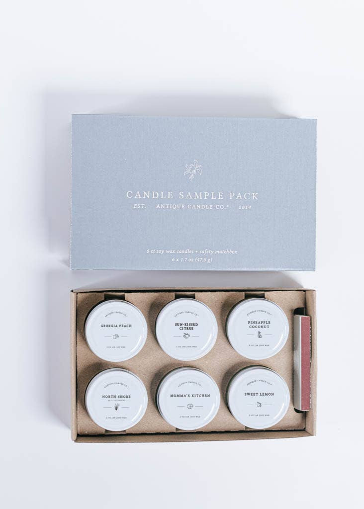 Summer Sampler Candle Pack (6 2 oz candles) - The Summer Sample Pack includes six hand-picked 2 oz Mason Jar candles and a matchbox.
Sweet Lemon: fresh lemon + sugar
Georgia Peach: sweet peach
Sun-Kissed Citrus: orange, pineapple, + berries
North Shore: pear, woods, + oakmoss
Pineapple Coconut: pineapple, coconut, + palm
Momma's Kitchen: cinnamon, apple, + pine