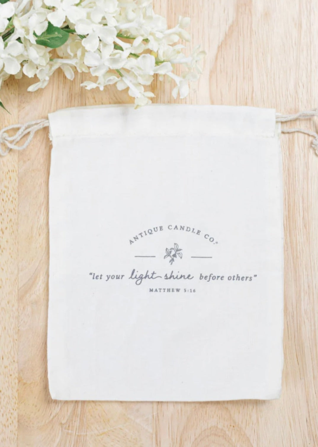 Antique Candle Co. White cotton muslin gift bag with Matthew 5:16 verse;