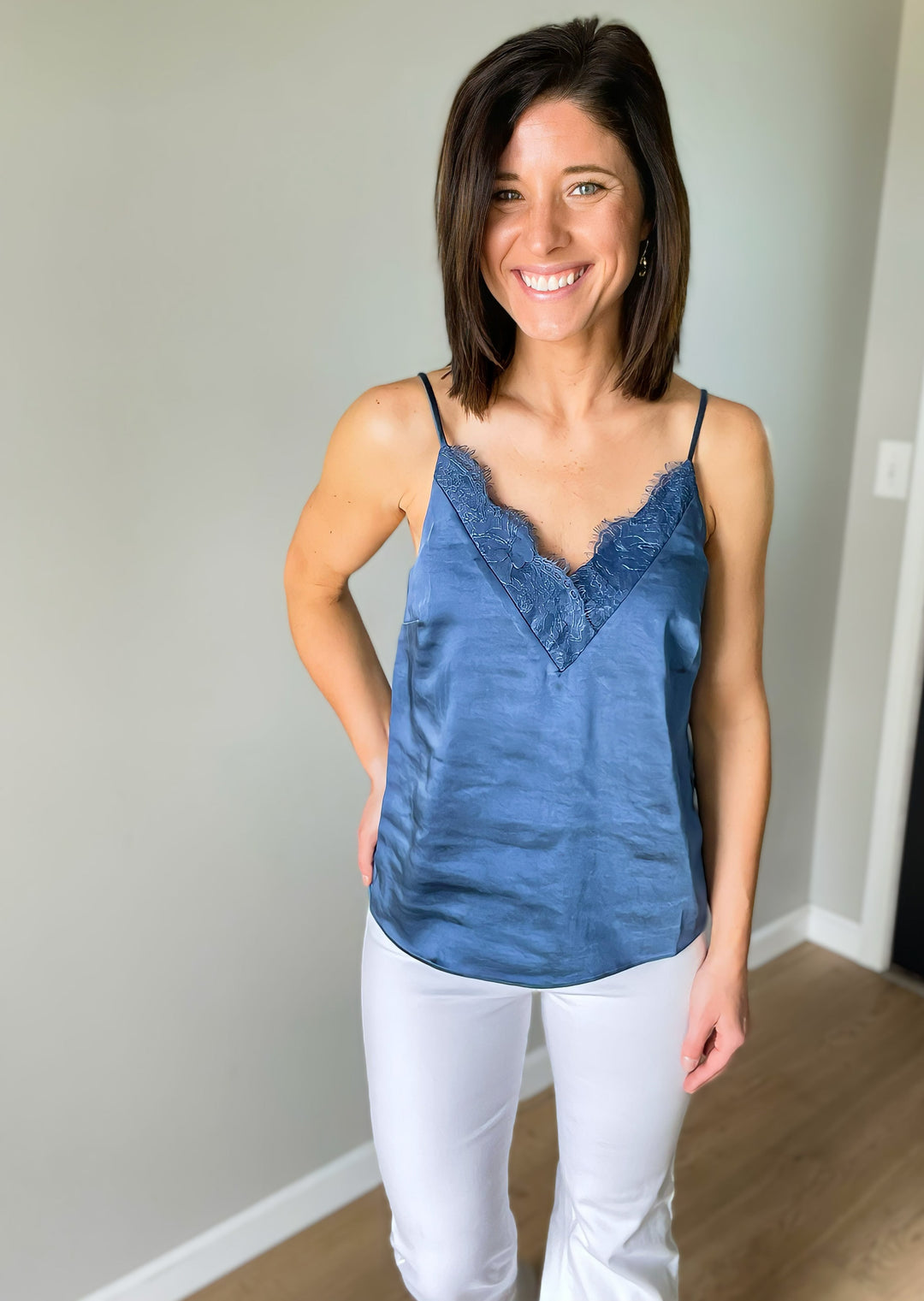 Smoky Blue Lace Camisole Top with adjustable straps, paired with white pants