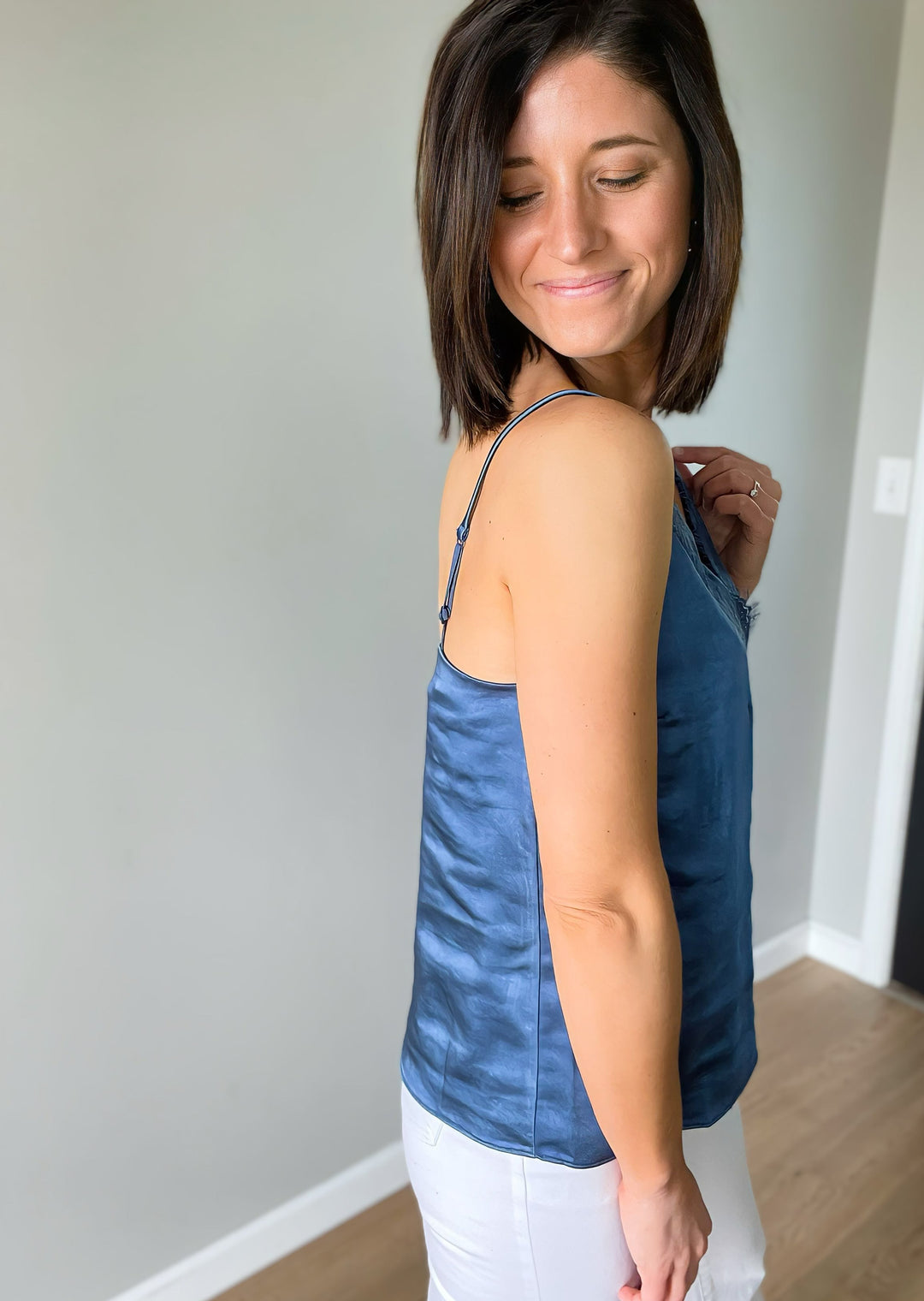 Smoky Blue Lace Camisole Top with adjustable straps, paired with white pants