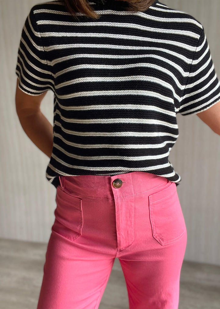 Cute Summer Outfit - Pink Cropped Wide Leg Pants with high waist paired with a light weight black and white striped short sleeve sweater