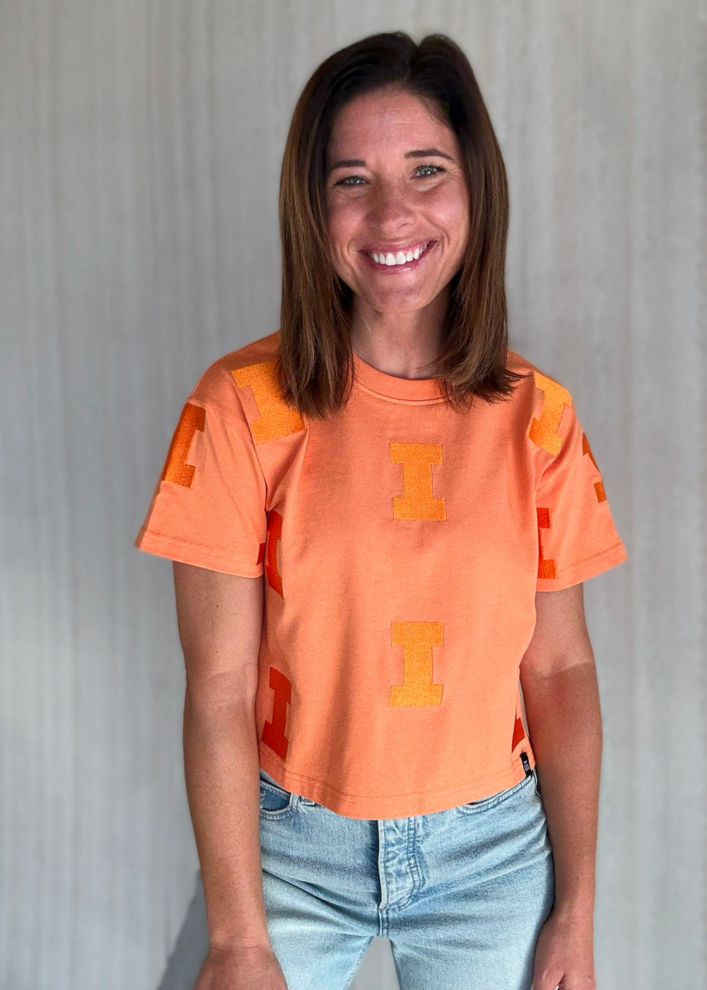 Women's Illinois Game Day Looks - Orange Sherbert Illinois Varsity "I" Repeat Tee | Cute Champaign-Urbana Game Day Outfits