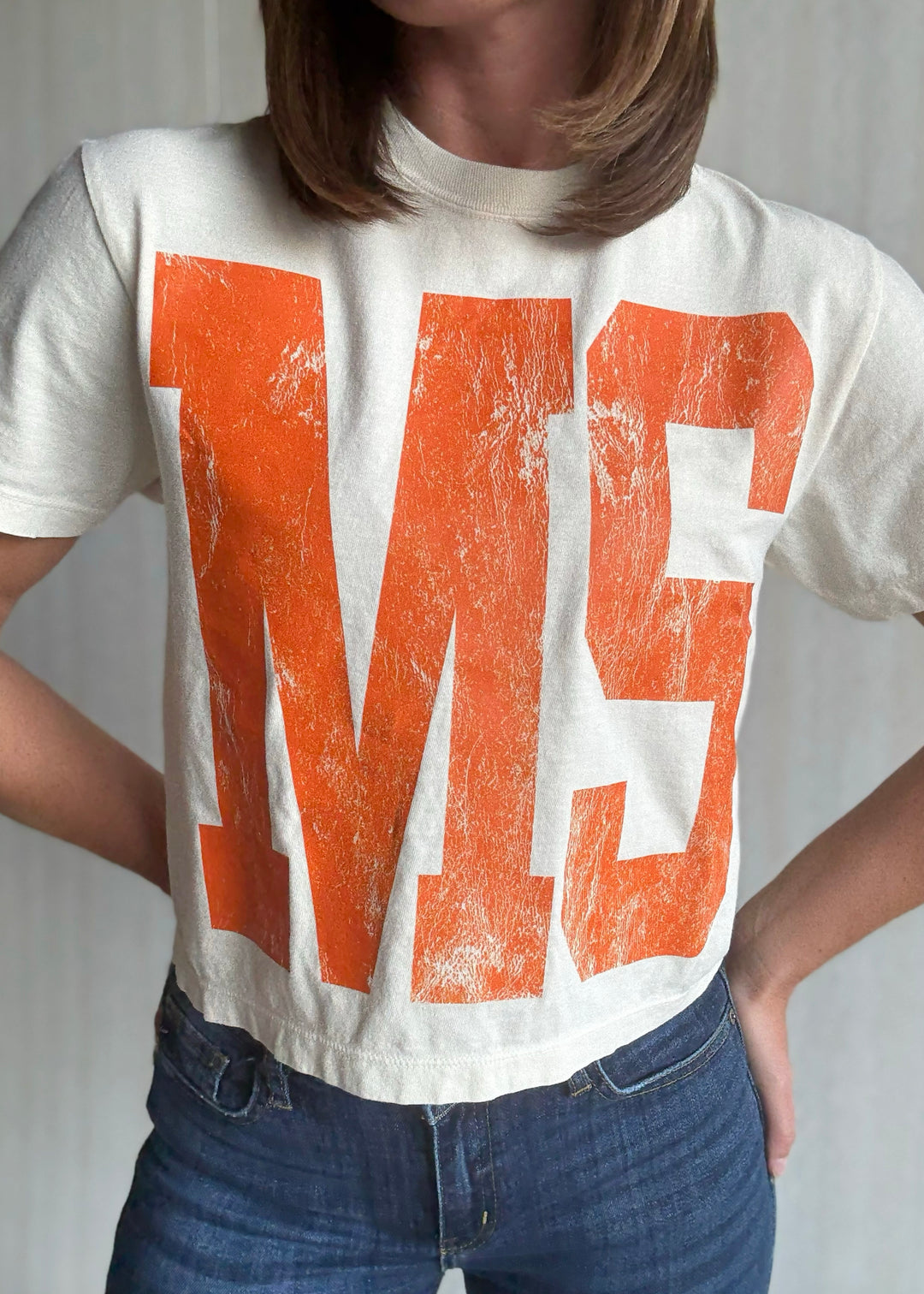 Women's Mahomet Seymour Cream and orange cropped t-shirt | Cute Mahomet Bulldogs Fanwear
