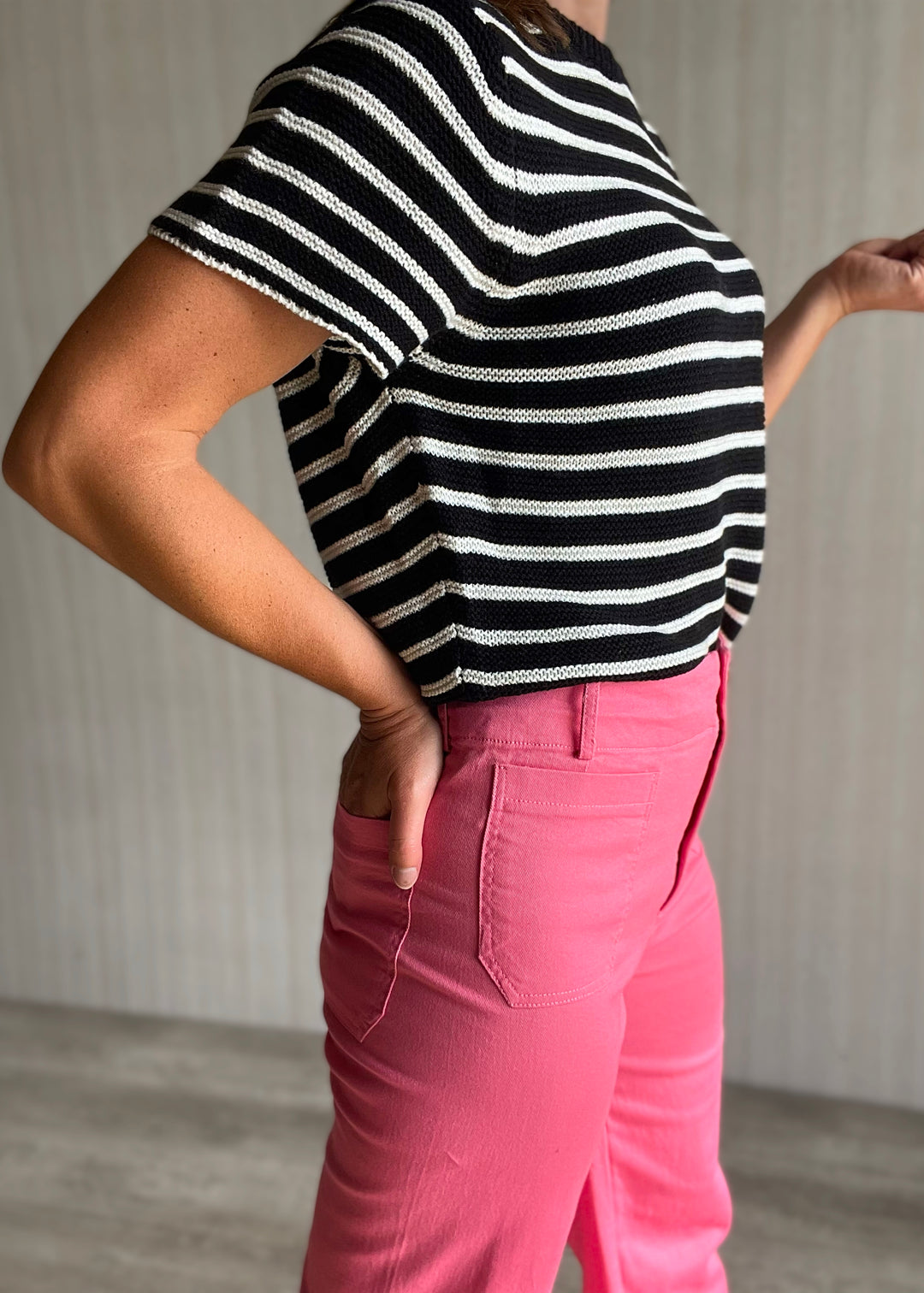 Cute Summer Outfit - Pink Cropped Wide Leg Pants with high waist paired with a light weight black and white striped short sleeve sweater