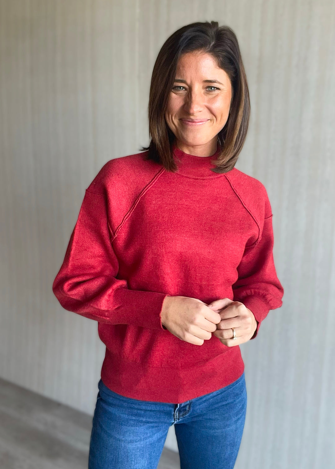 Women's Red Exposed Seam Sweater with mock neck