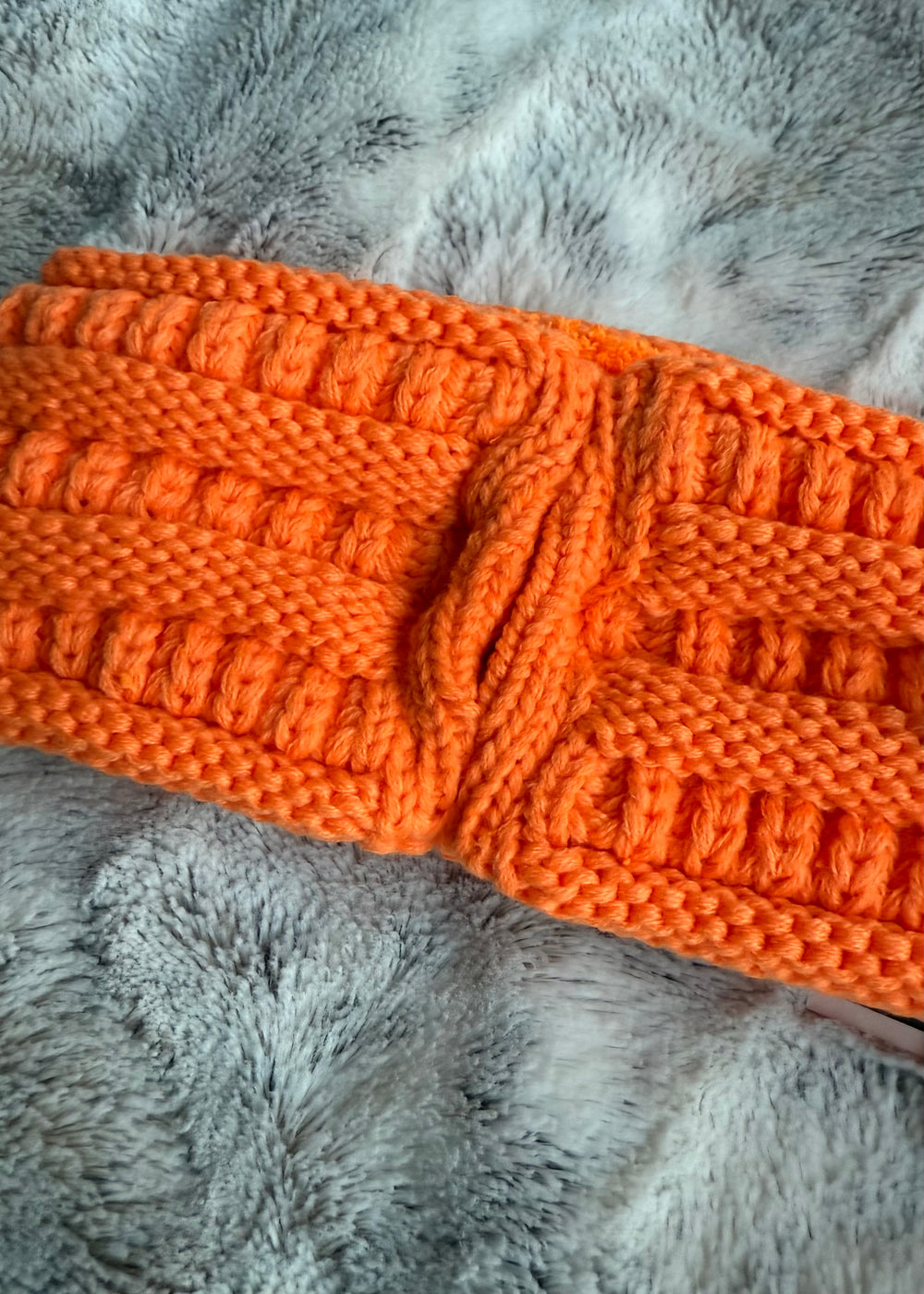 Orange knitted cozy ponytail winter headband