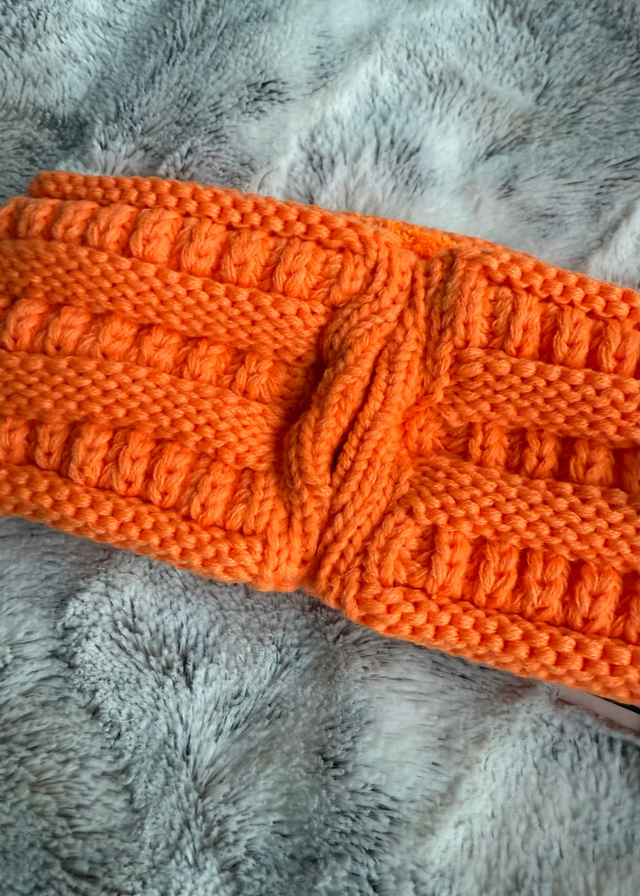 Orange knitted cozy ponytail winter headband