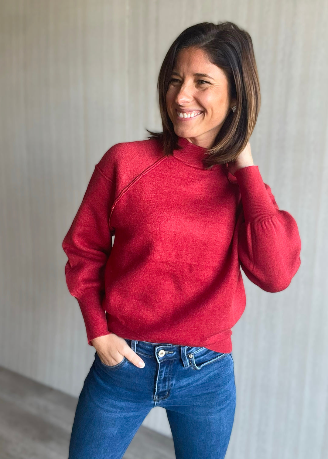 Women's Red Exposed Seam Sweater with mock neck