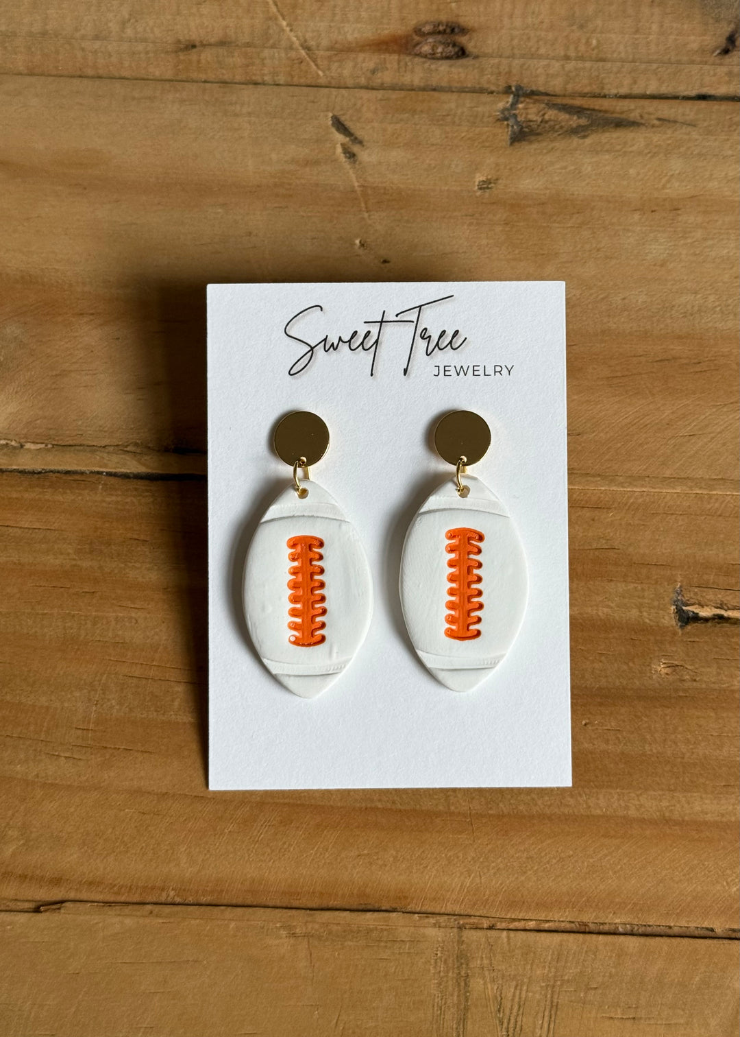 White & Orange Football Dangle Earrings