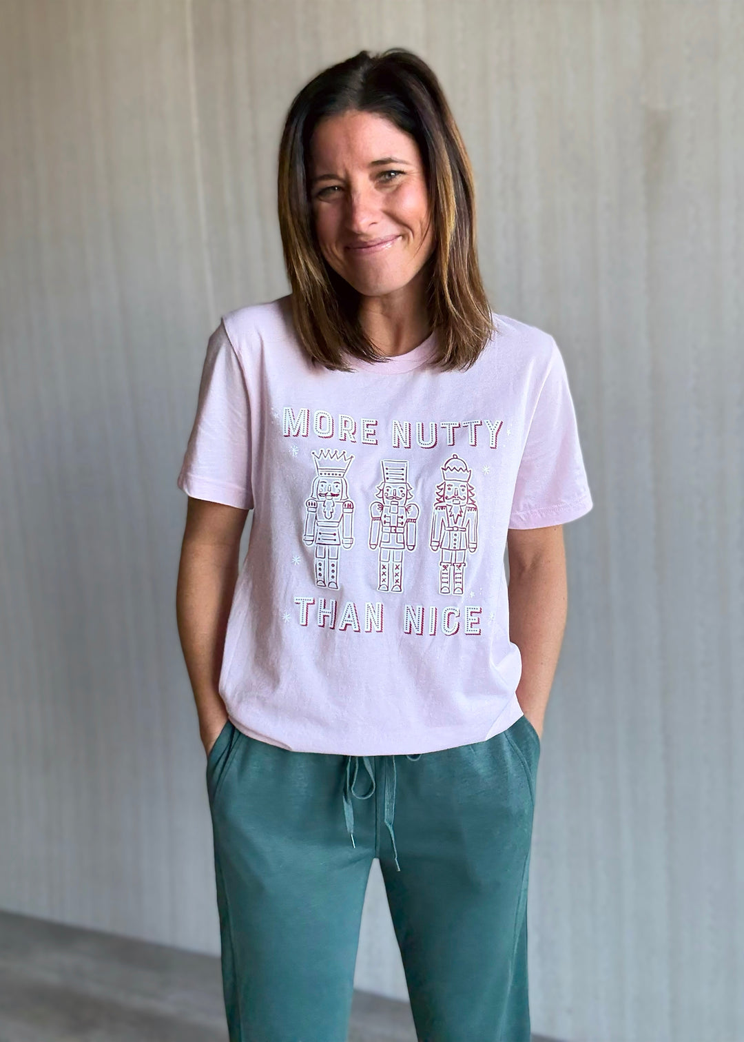 Women's Christmas Nutcracker t-shirt. Pink More Nutty Than Nice T-shirt