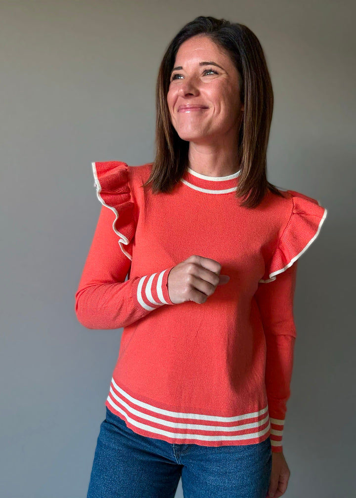 Women's Coral Orange Ruffle Shoulder Sweater with off-white cream stripes | Orange Sweaters for Game Day Outfits