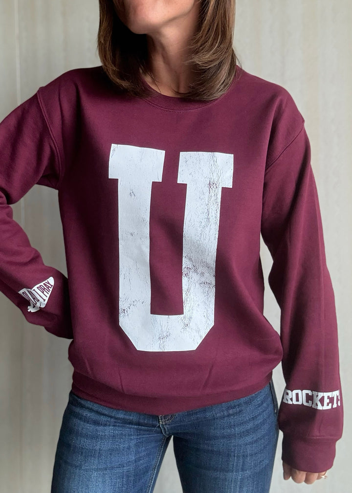 Maroon sweatshirt with a large white 'U' on a neutral background | Women's Unit Rockets Sweatshirt Fanwear