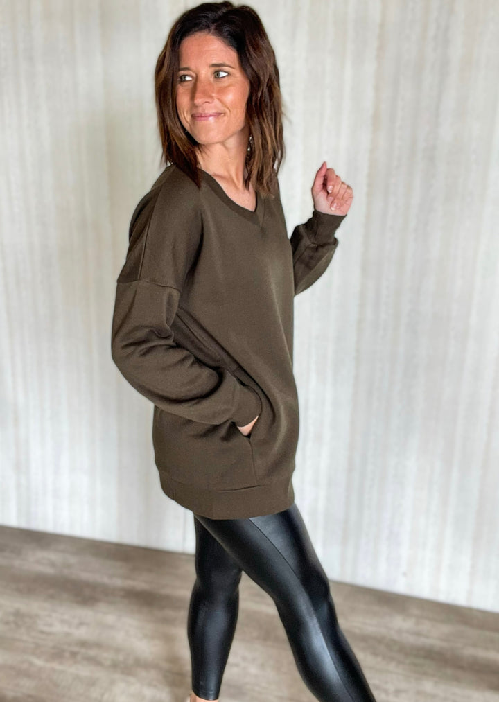 Olive Green V-Neck Pullover Sweatshirt with Pockets and Black Faux Leather Leggings