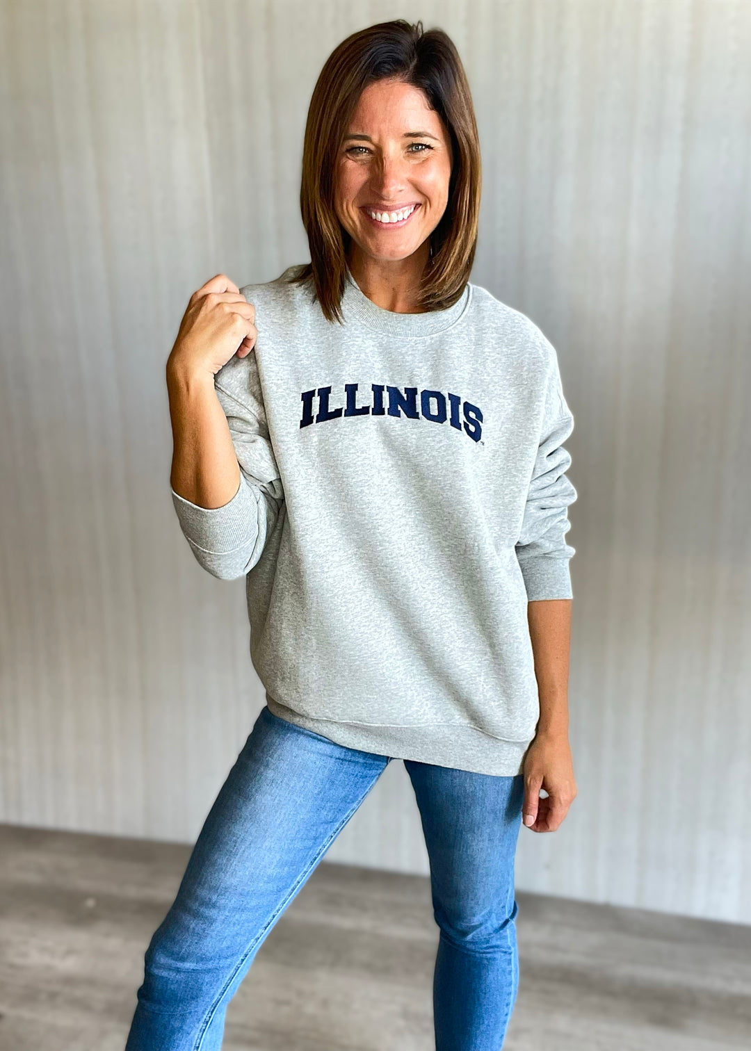 Women's Gray Illinois Pocket Crew Sweatshirt with jeans