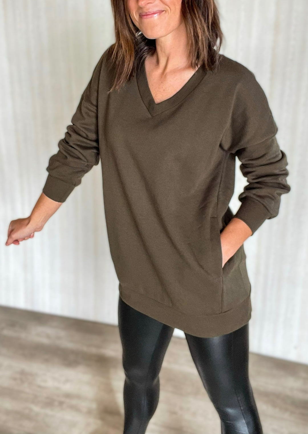 Olive Green V-Neck Pullover Sweatshirt with Pockets and Black Faux Leather Leggings