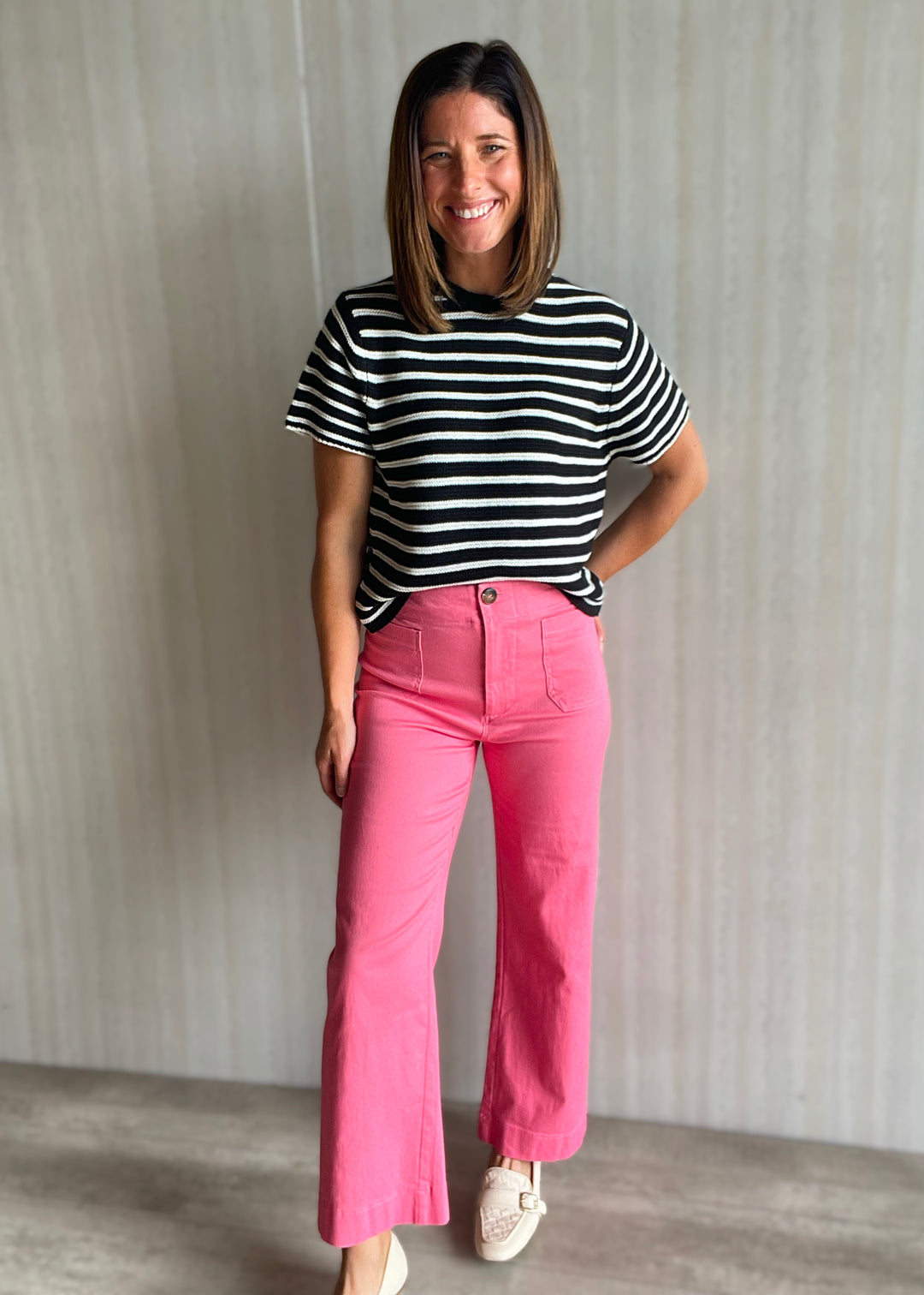 Cute Summer Outfit - Pink Cropped Wide Leg Pants with high waist paired with a light weight black and white striped short sleeve sweater