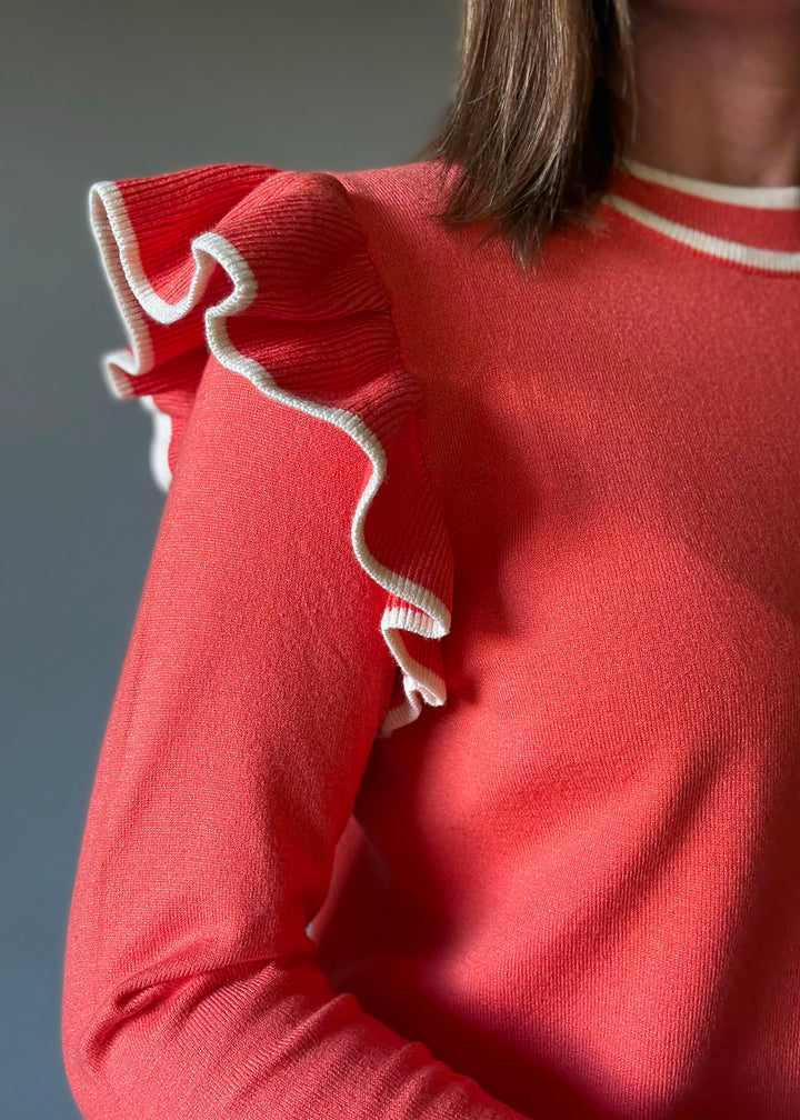 Women's Coral Orange Ruffle Shoulder Sweater with off-white cream stripes | Orange Sweaters for Game Day Outfits