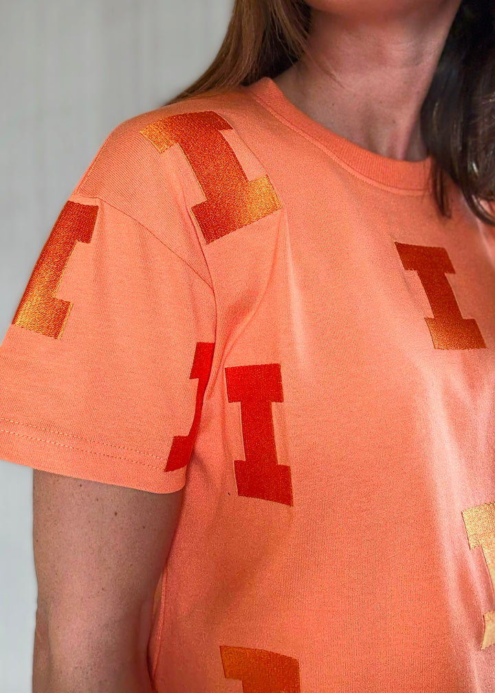 Women's Illinois Game Day Looks - Orange Sherbert Illinois Varsity "I" Repeat Tee | Cute Champaign-Urbana Game Day Outfits