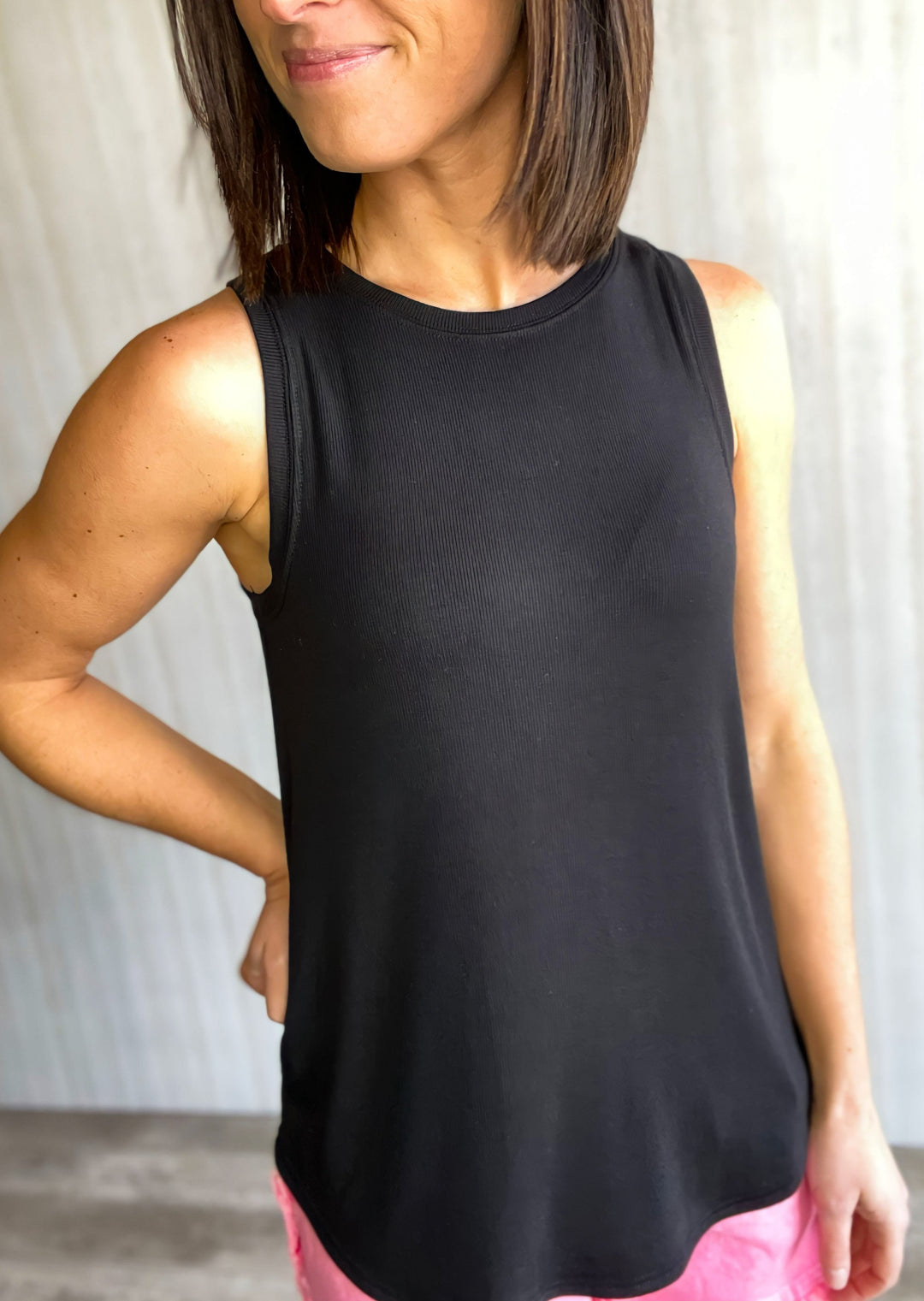 Basic black ribbed tank top with relaxed fit