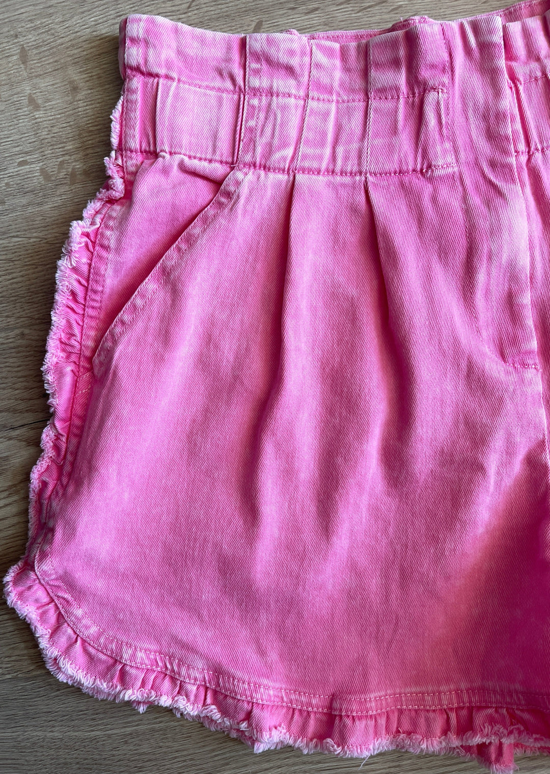 Pink Pleated Shorts at Embolden