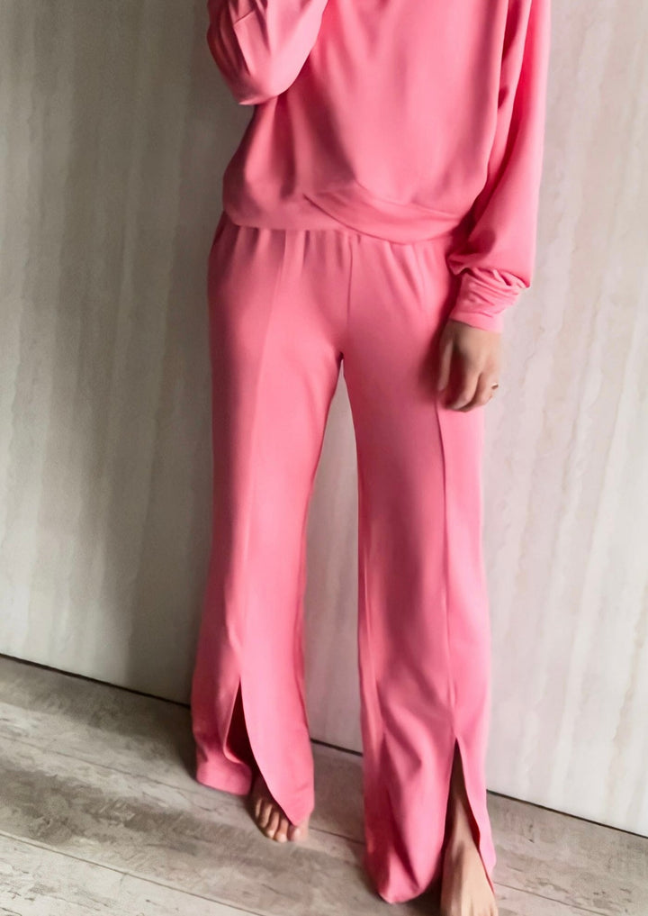 Women's Pink Athleisure Loung Set with split leg pants and a crossover detail pullover top.
