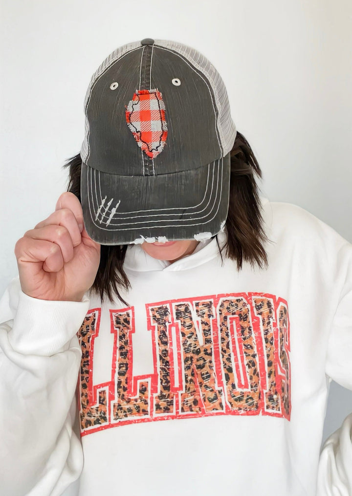 Illinois Trucker Hat with Orange and Gray checkered state of Illinois. Charcoal color with light gray netting in back.