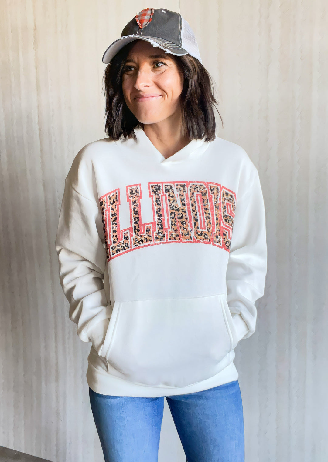 Illinois Hoodie White Sweatshirt with Illinois text across the chest in a leopard print with orange outline