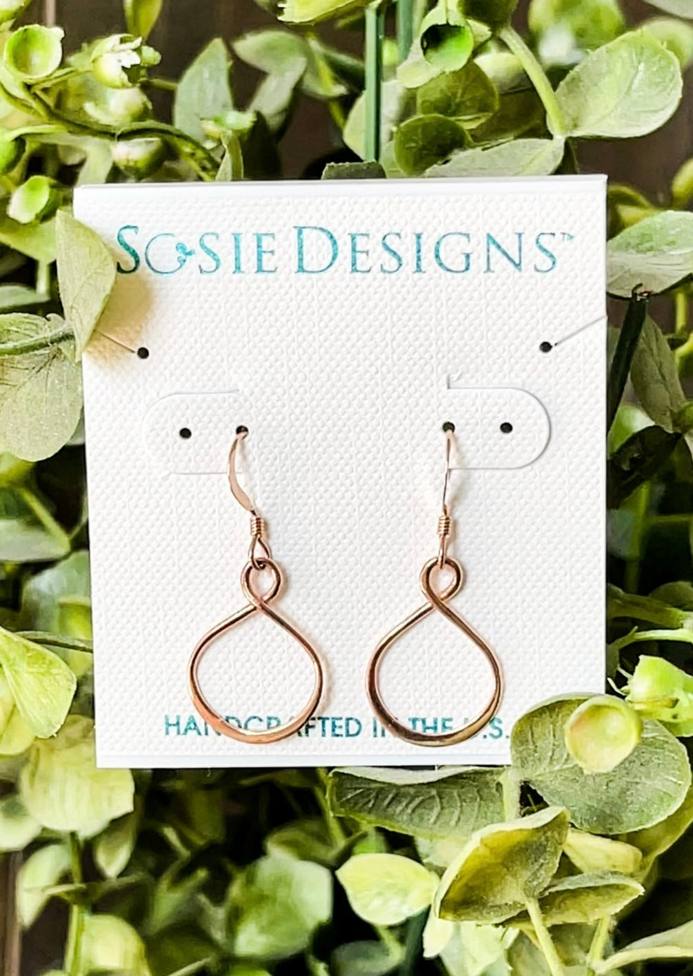 Rose Gold Eternity Earrings | Rose gold earrings with a twisted hoop.